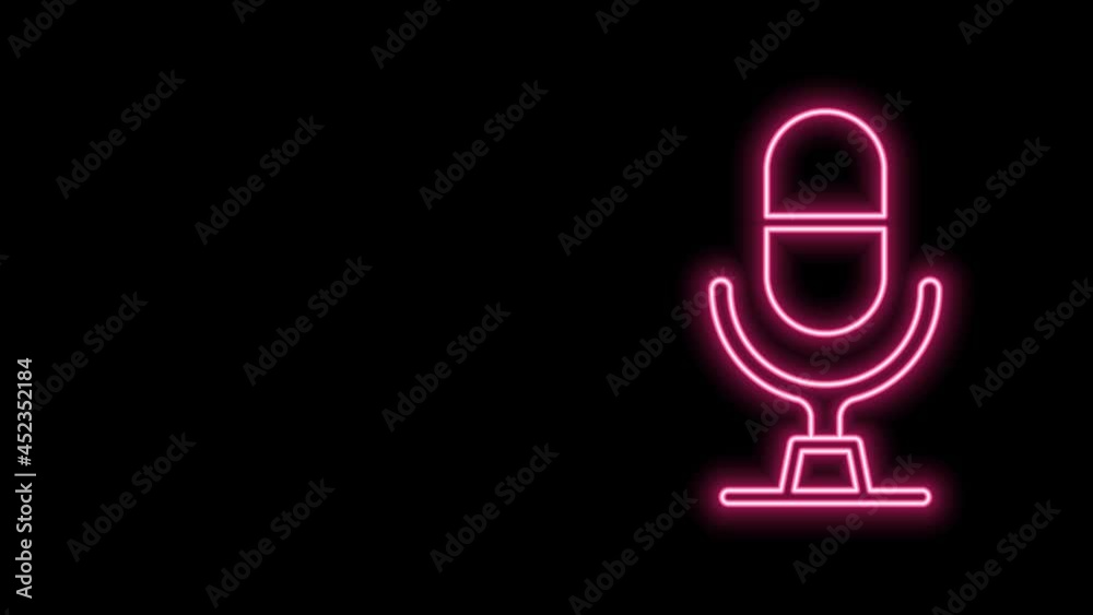 Glowing neon line Microphone voice device icon isolated on black background. Microphone interpreter and alphabet letters. 4K Video motion graphic animation