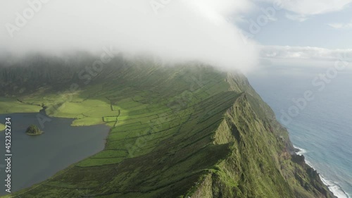 Aerial view of Caldeirao, a lake along the coastline on Corvo island, Azores islands, Portugal. photo
