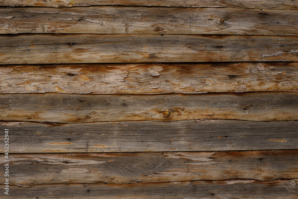 Shabby textured background of wall with wooden planks of natural timber Shabby textured background of wall with wooden planks of natural timber
