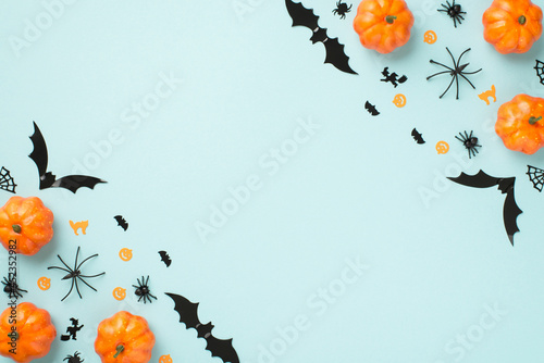 Фотография Top view photo of halloween decorations pumpkins spiders cobweb cat witch and ba
