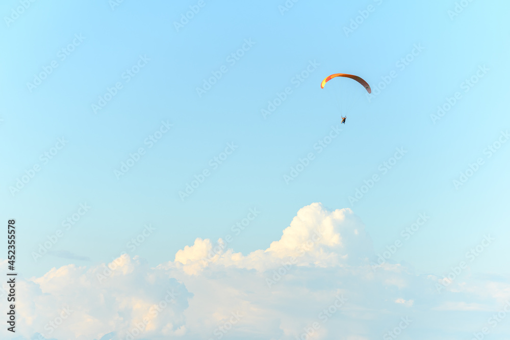 Paragliding flight in the air over the mountains. Paragliding flight in the air over the mountains.