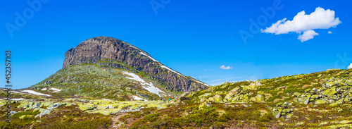 Amazing Panorama Storehødn mountain peak at Hydnefossen waterfall Hemsedal Norway. photo