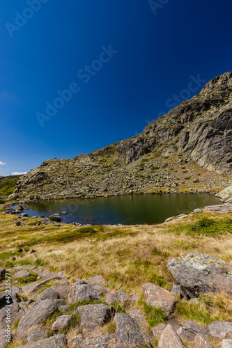 A lake in the Peñalara mountains in the Northern Mountain range of Madrid. This part has wonderful hikes starting and panoramic views over the hills and valleys. 