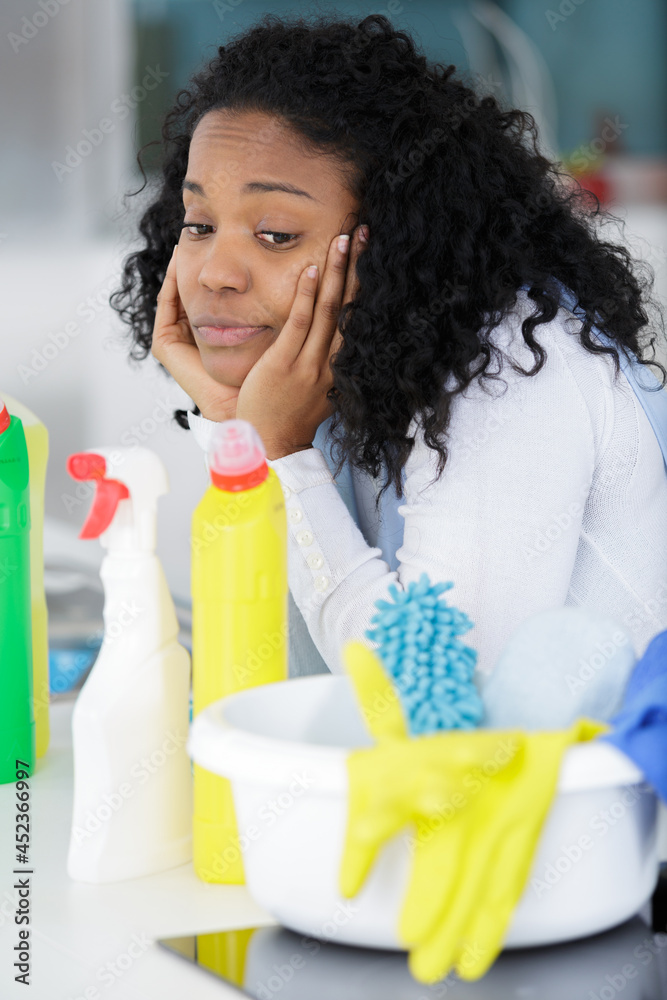 an unhappy housekeeper looking at products an unhappy housekeeper looking at products