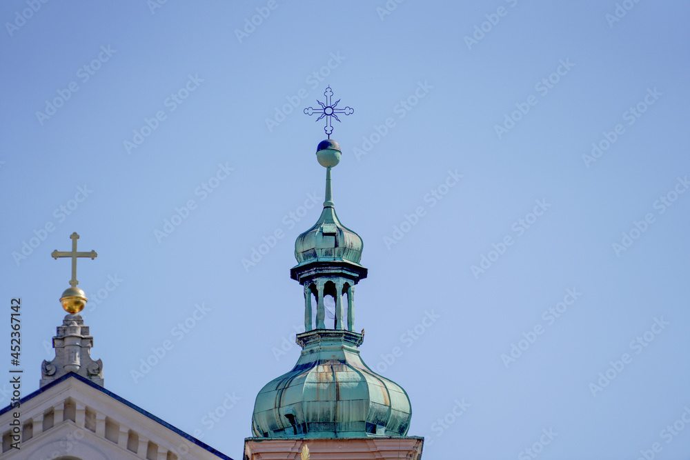 Onion dome with onion helmet or onion dome photographed on a church tower as an architectural roof construction in Bavaria Onion dome with onion helmet or onion dome photographed on a church tower as an architectural roof construction in Bavaria