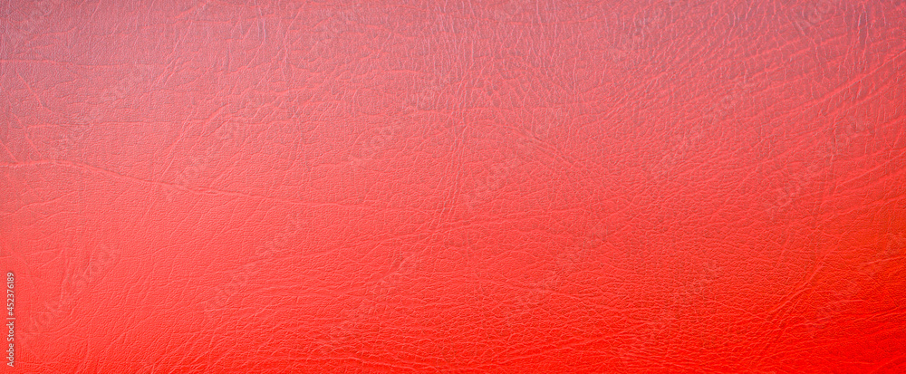 Fototapeta premium Red leather texture, vintage abstract background. Close-up.