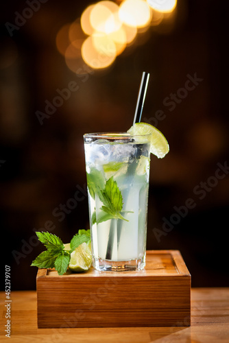 mojito cocktail on wooden table