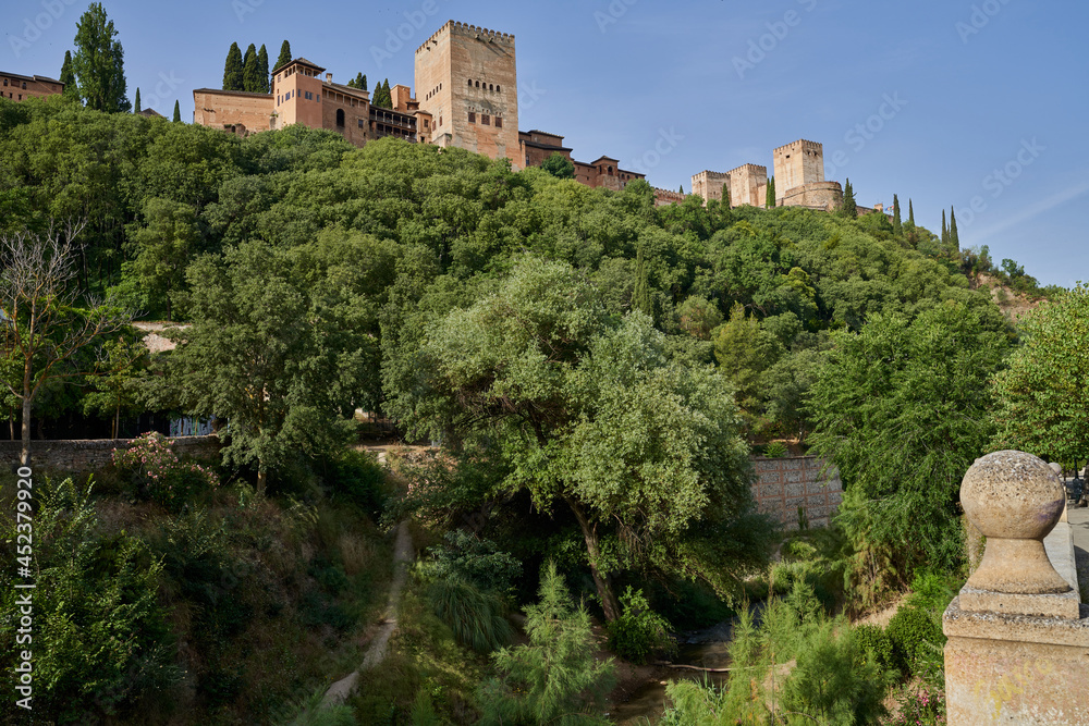 View of the Alhambra from the Paseo de los Tristes. In Granada, Spain 