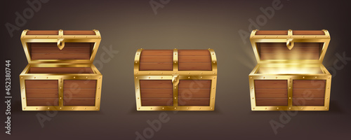 Set of wooden chests with open and closed lid, full of shining golden coins and empty realistic photo