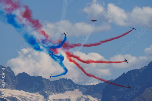 Alpha jets from patrouille de France (french air force) - at Alpe d'Huez during an air show in August 2021 photo
