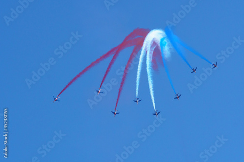 Alpha jets from patrouille de France (french air force) - at Alpe d'Huez during an air show in August 2021 photo