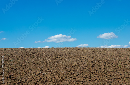 a field ready for sowing and blue sky
