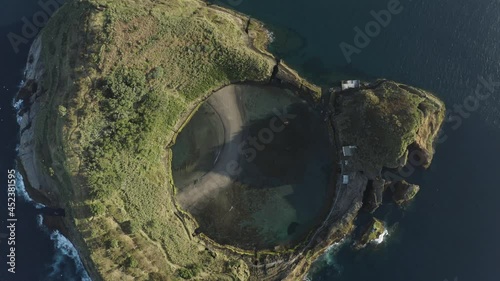 Aerial view of Ilheu da Vila, a small island off San Miguel island in the middle of the ocean, Azores islands, Portugal. photo