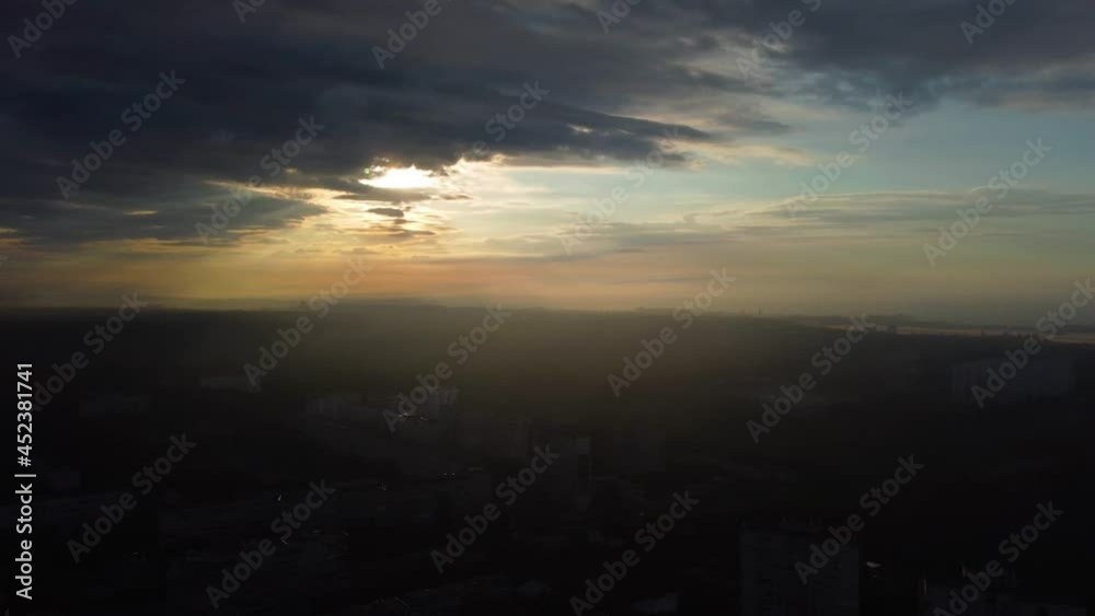 Aerial speed up right to left panoramic view on epic city in sunrise light with clouds and sun shine. Early morning flight above sleeping city. Kharkiv, Ukraine Aerial speed up right to left panoramic view on epic city in sunrise light with clouds and sun shine. Early morning flight above sleeping city. Kharkiv, Ukraine