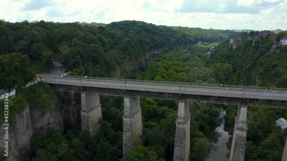 Huge stone bridge over the valley and forest in Kam'yanets'-Podil's'kyi in Ukraine. Huge stone bridge over the valley and forest in Kam'yanets'-Podil's'kyi in Ukraine.