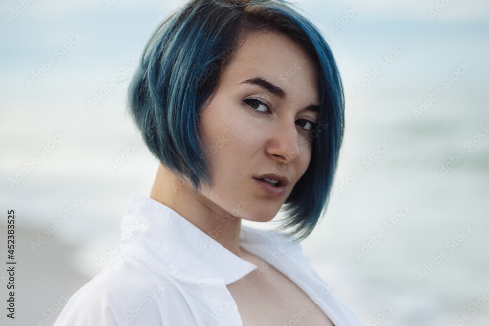 Portrait of a girl with blue hair at beach Portrait of a girl with blue hair at beach