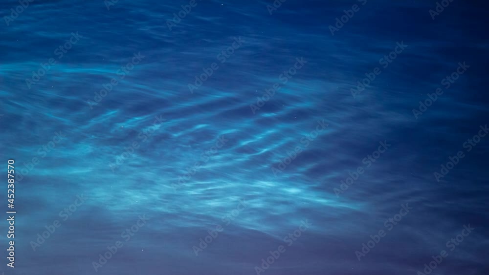 Time lapse of blue silvery clouds or noctilucent clouds or night shining clouds. Noctilucent clouds scenic time lapse. Time lapse of blue silvery clouds or noctilucent clouds or night shining clouds. Noctilucent clouds scenic time lapse.