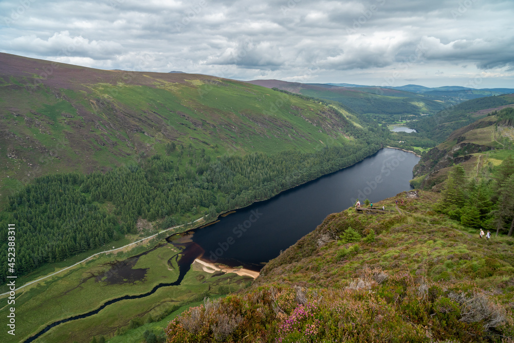 Naklejka premium Panoramic idyllic view of Glendalough Valley, County Wicklow Upper lake from miners way, Glenealo valley, Wicklow way, County Wicklow, Ireland.