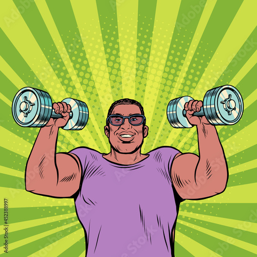 a black man lifts dumbbells, sports and health, morning exercises. Businessman daily routine