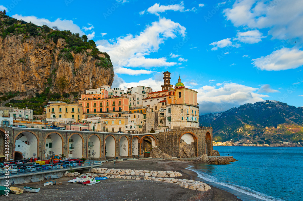 Atrani, Italy - January 19, 2017: a small coastal town, just a short drive away from Amalfi, with pretty multi-colored houses nestled on steep cliffs, is one of the most picturesque and idyllic towns 
