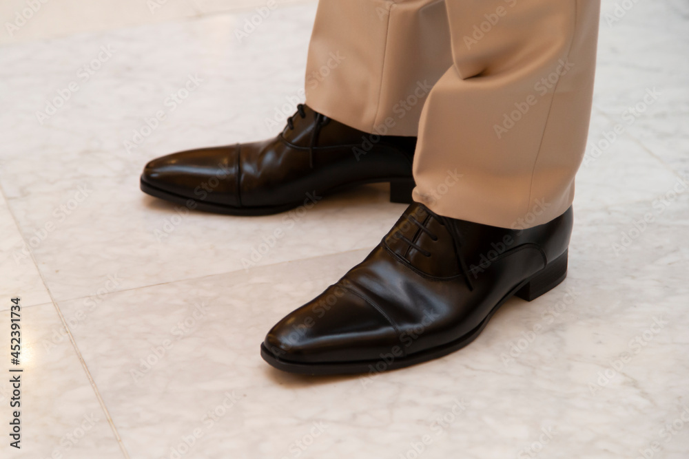 The feet where a man is standing The feet where a man is standing