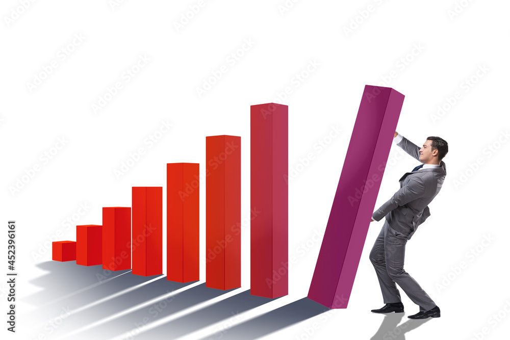Businessman supporting economic growth on chart Businessman supporting economic growth on chart