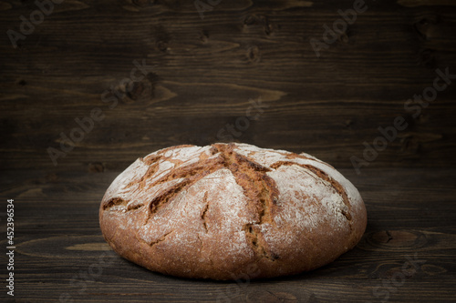 Rye bread on wooden background