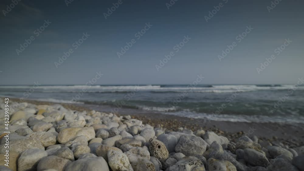 Pebble beach and tide coming in Pebble beach and tide coming in