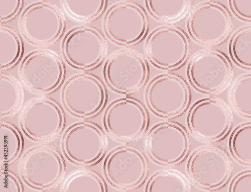 Geometric seamless pattern with rose gold volumetric circle tiles.