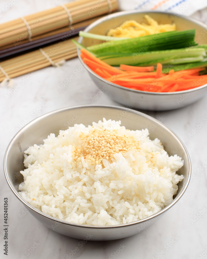 White Rice with Sesame Seed and Fresh Vegetable, preparation Making Korean Rice Roll Kimbap or Gimbap White Rice with Sesame Seed and Fresh Vegetable, preparation Making Korean Rice Roll Kimbap or Gimbap