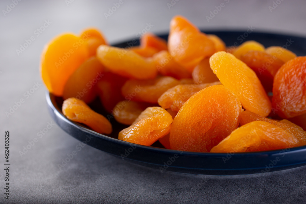 A view of a plate of dried apricots. A view of a plate of dried apricots.