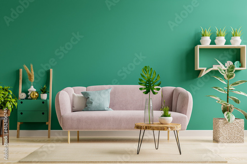 Green interior in modern interior of living room style with soft sofa and green wall. photo