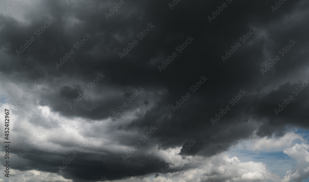 dark storm clouds with background,Dark clouds before a thunder-storm. dark storm clouds with background,Dark clouds before a thunder-storm.