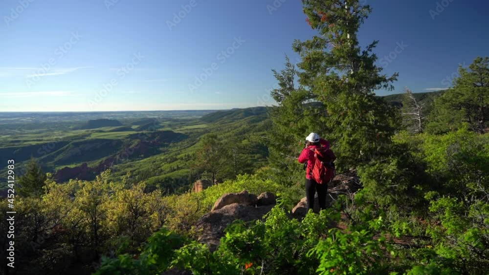Landscape Photographer With Backpack Taking Photos of Stunning Roxborough State Park, Colorado USA, Full Frame Landscape Photographer With Backpack Taking Photos of Stunning Roxborough State Park, Colorado USA, Full Frame
