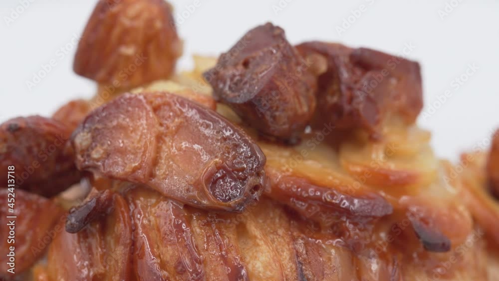 Almonds croissant rotating in front of camera, Close-up rotates view of Croissant with Honey Almond Almonds croissant rotating in front of camera, Close-up rotates view of Croissant with Honey Almond