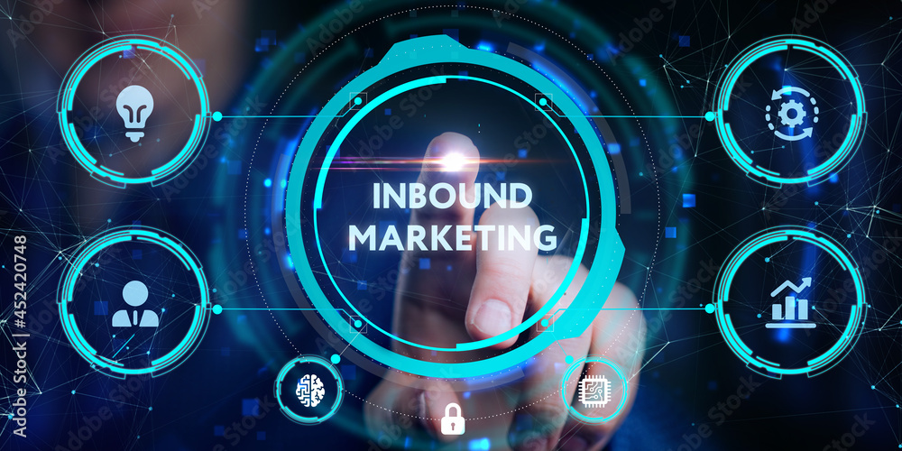 The concept of business, technology, the Internet and the network. A young entrepreneur working on a virtual screen of the future and sees the inscription: Inbound marketing