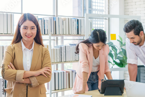 businessman and secretary with team business working together using laptop computer at modern office, Lifestyle business work at home concept