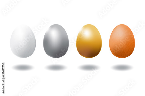 Set of white, silver, gold and brown eggs.