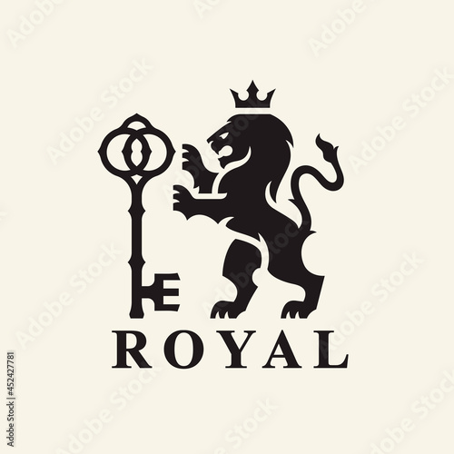 Heraldry Lion logo design. Royal animal crest symbol with key and crown icon. Vector illustration.