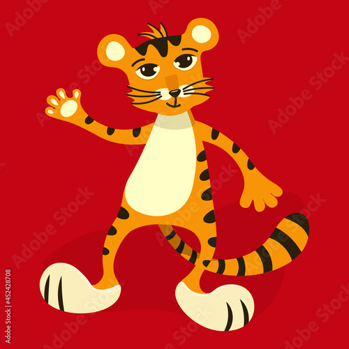 Funny tiger cub on a bright red background. A cute character waves his paw. The fire tiger is the symbol of the year 2022. A good luck charm . Exclusive vector for design, printing, individual use
