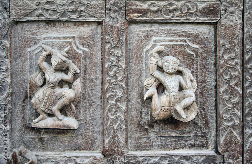 Detail of wooden carved wall ornament in Shwenandaw monastery, Mandalay, Myanma