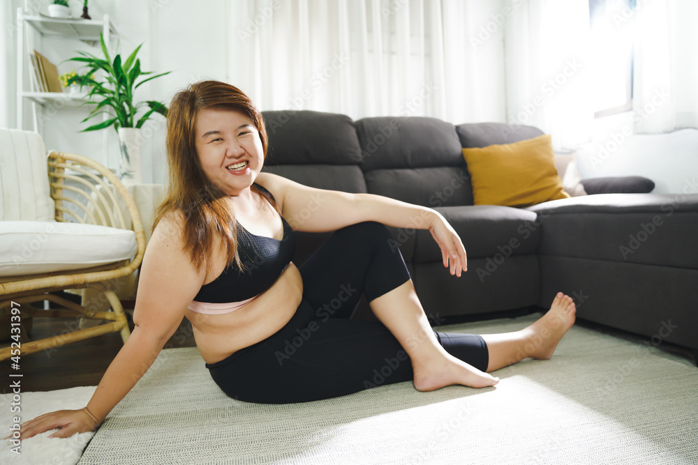 Body confidence. Asian woman Overweight plus size woman wearing sportswear for exercising. self confident Body positive concept. Body confidence. Asian woman Overweight plus size woman wearing sportswear for exercising. self confident Body positive concept.