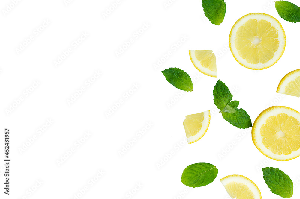 Mojito, lemonade cocktail or sour infused water ingredient. Flatlay with sliced lemon and mint leaves, copy space