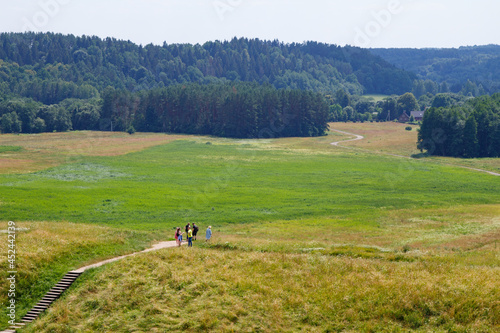 Hilly country. Walking paths up the mountain. Kernavė, site of the ancient city. High hills by the river. Wooden staircase to the mountain. The famous Lithuanian landscape. © Dmitry Koshelev