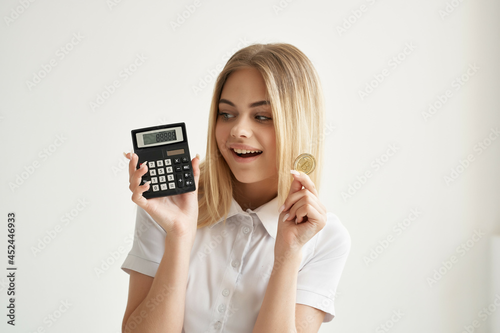 Businesswoman in a white shirt with a folder in hand light background