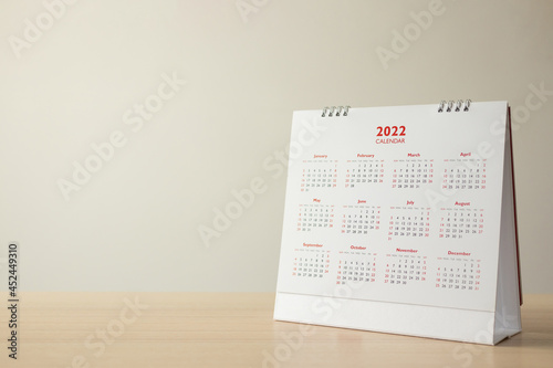 Close up 2022 calendar page dates and month background business planning appointment meeting concept