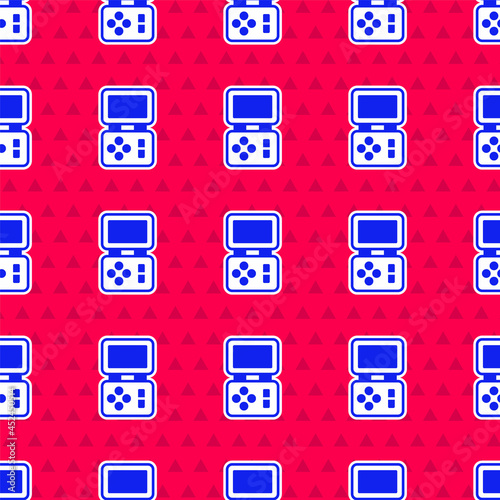 Blue Portable tetris electronic game icon isolated seamless pattern on red background. Vintage style pocket brick game. Interactive playing device. Vector