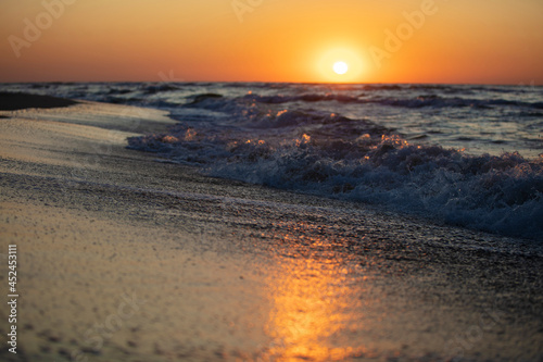 Beautiful sea landscape. Sunset and waves.