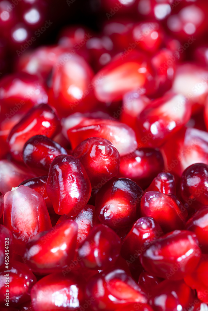 red and ripe fruit pomegranate with red grains red and ripe fruit pomegranate with red grains