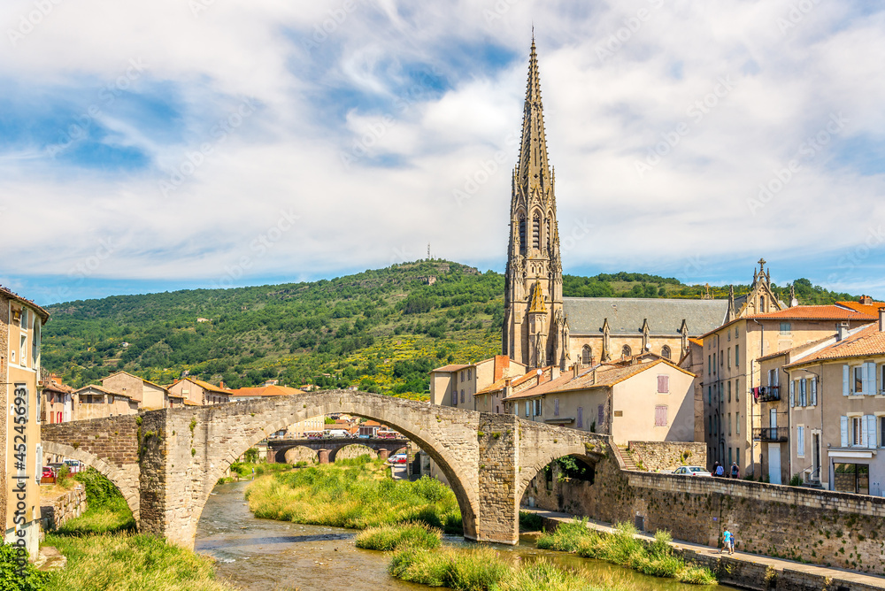 View at the Old bridge and Church of Notre Dame in Saint-Affrique, France